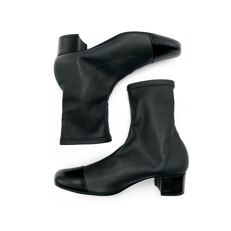 Stivaletti neri a calza in similpelle elasticizzata e punta in pelle nera