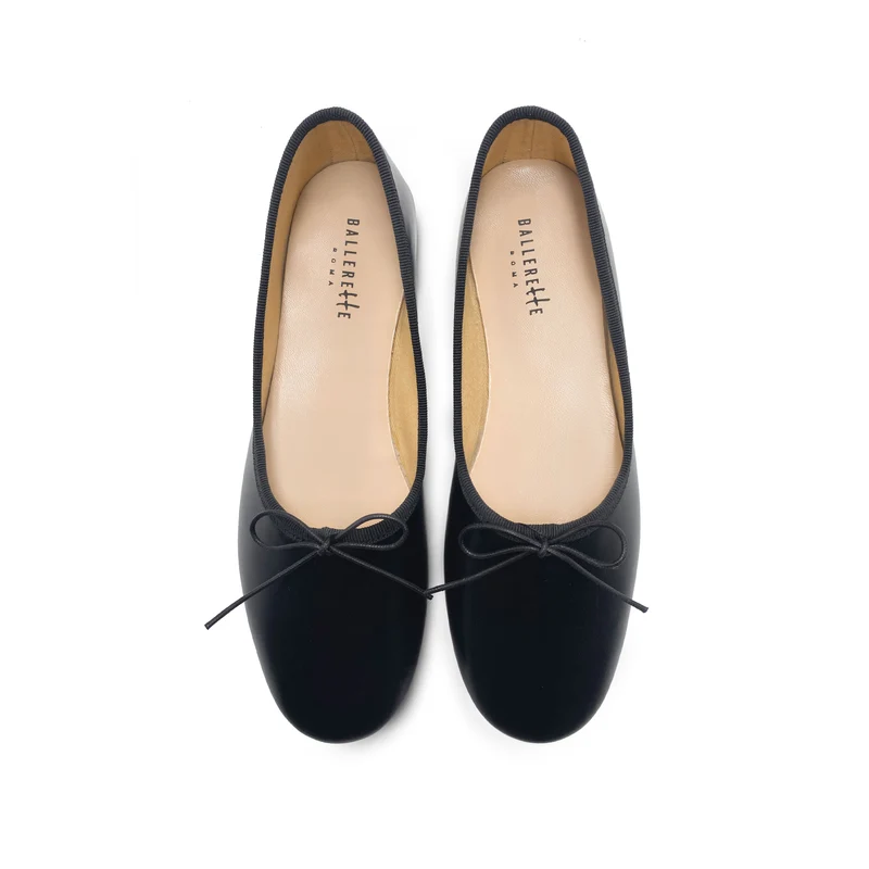 Ballerine "glove shoes" nere accollate in pelle